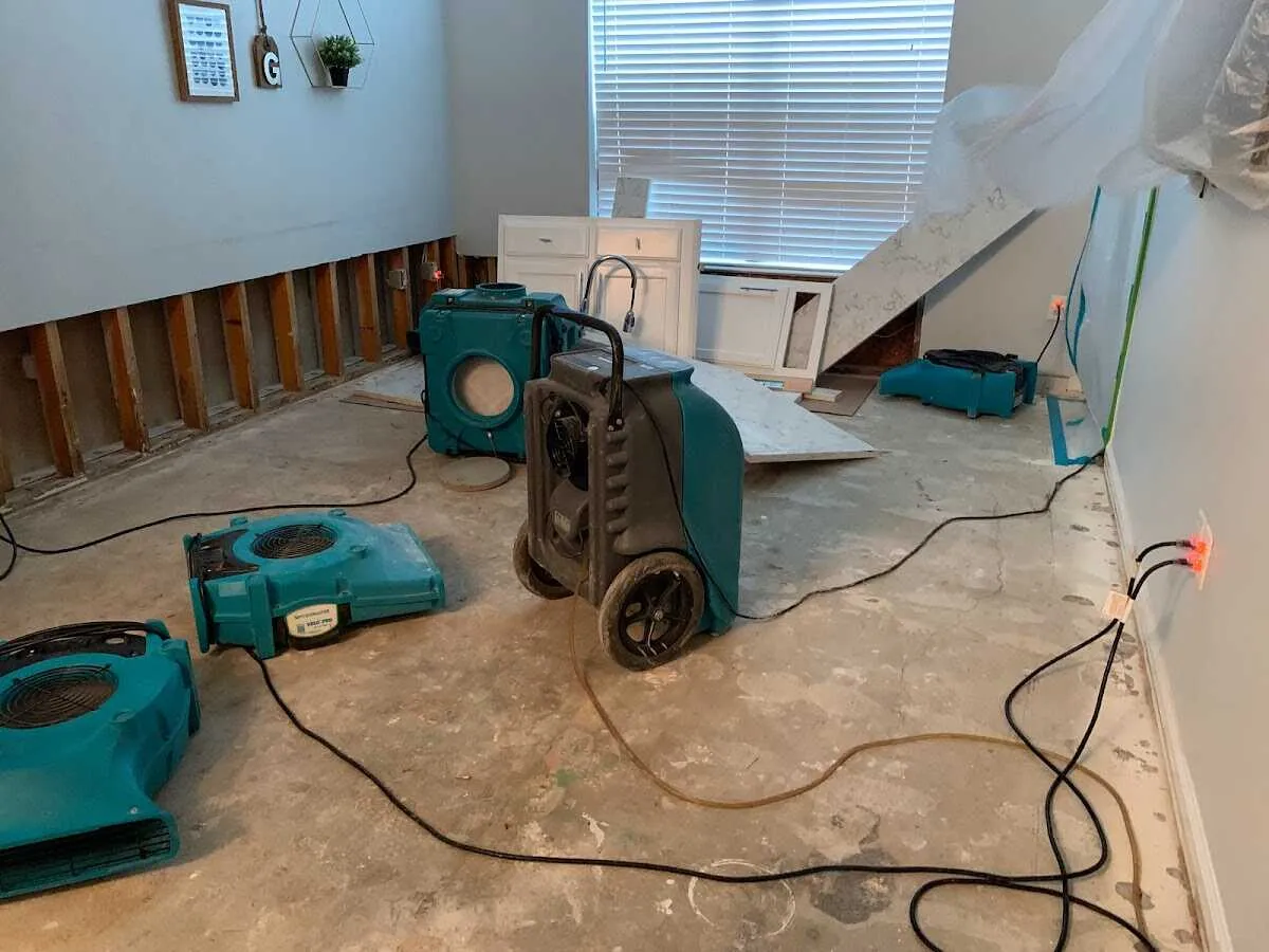 Dehumidifier in flood-cut room for Water Damage Restoration in Palm Beach